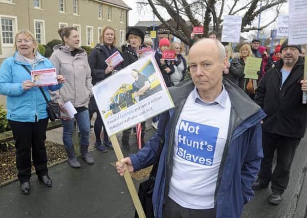 Mark Smith leads a group from the Gosport Labour Party as they stage a protest outside Gosport War Memorial Hospital highlighting the need for an A&E department

Picture: Ian Hargreaves  (180190-1)