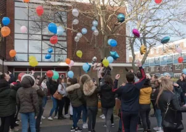 Friends and family of Ollie Blatcher released balloons yesterday to celebrate his life.