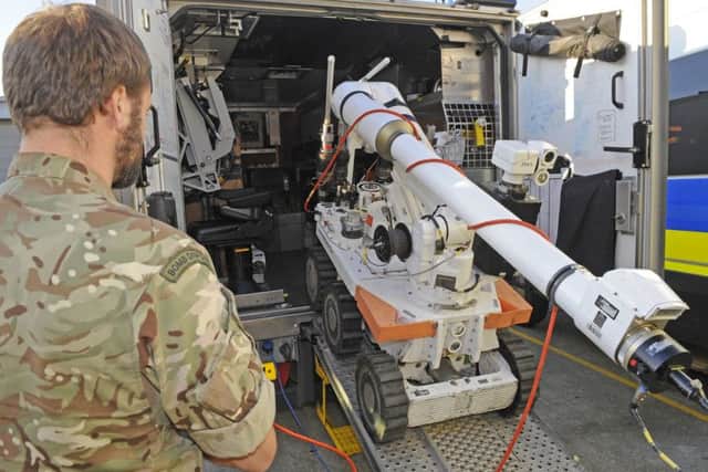'Cutlass' - a very hi-tech RCV - is brought out of one of the unit's vehicles
