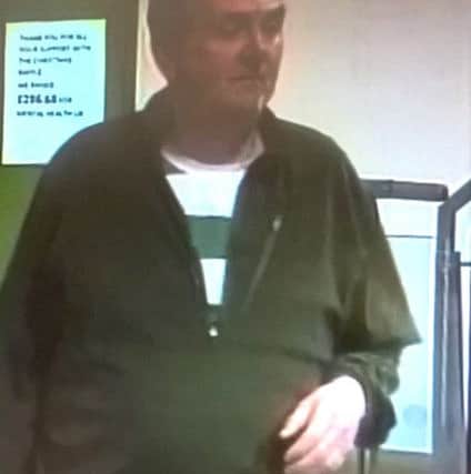 Missing Portsmouth man Scot Mackenzie on CCTV at Lloyds Bank