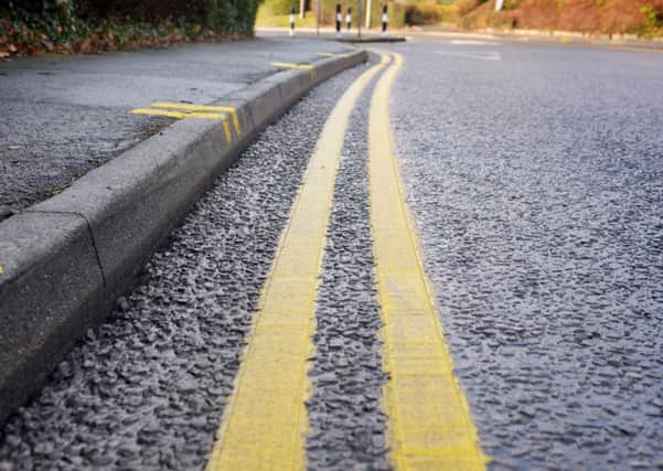 Could double-yellow lines be painted on your road?