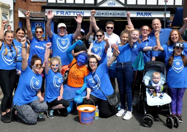 Blue Day fundraising walkers leave Fratton Park in 2016