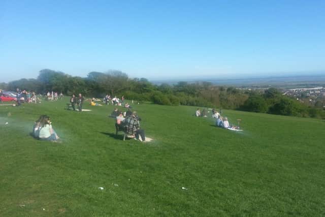 People soaking up the sun on Portsdown Hill outside Portsmouth. The CPRE wants to see green belts created outside Hampshire's towns and cities