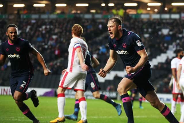 Matt Clarke celebrates his goal against MK Dons. Picture: Joe Pepler