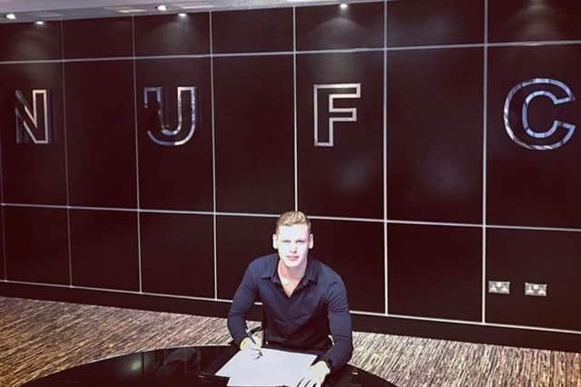 Olly Long signs his first professional contract at Newcastle United