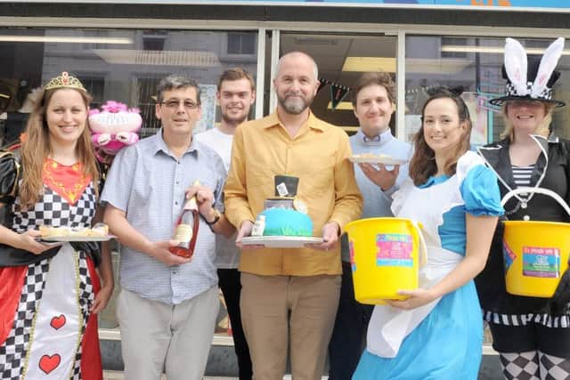 Naomi House charity shop in Fareham was one of the shops which took part in 'Store Wars', a collaboration with Wilkins Kennedy Accountants   Pictured are: (L-r) Naomi Nesbit, Stephen Rowe, Aaron Cleeve, Simon Owen, Travers Allen, Alice Andrews and Samantha Davis   Picture: Sarah Standing (170960-5538)