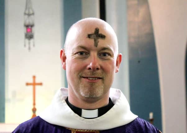Rev Paul Chamberlain with his Ash Wednesday cross