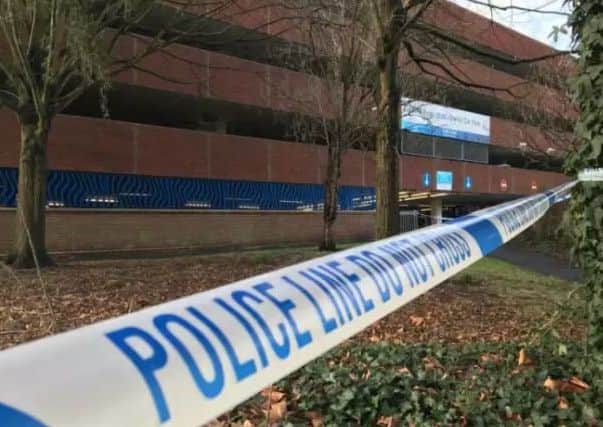 The police cordon around the multi-storey car park in Osborn Road