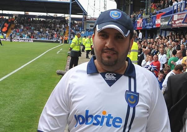 Sulaiman Al-Fahim meeting Pompey fans in the south stand in 2009. Picture: Steve Reid