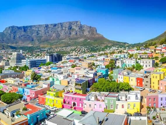 Table Mountain and colourful houses.