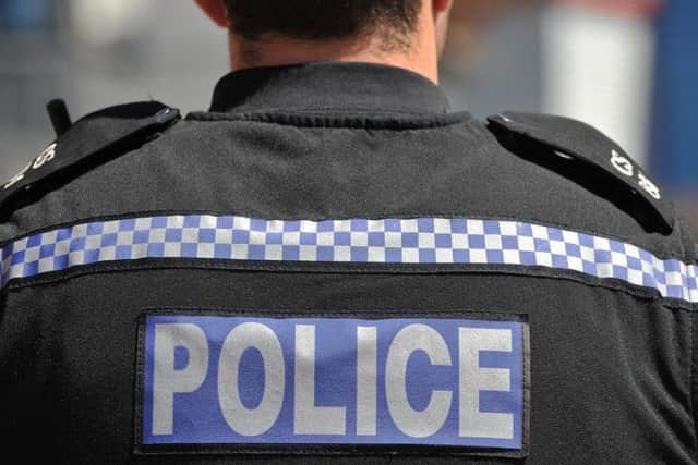 Police funding caused a spat at a meeting of Portsmouth City Council