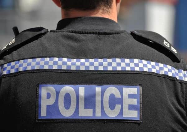 Police funding caused a spat at a meeting of Portsmouth City Council