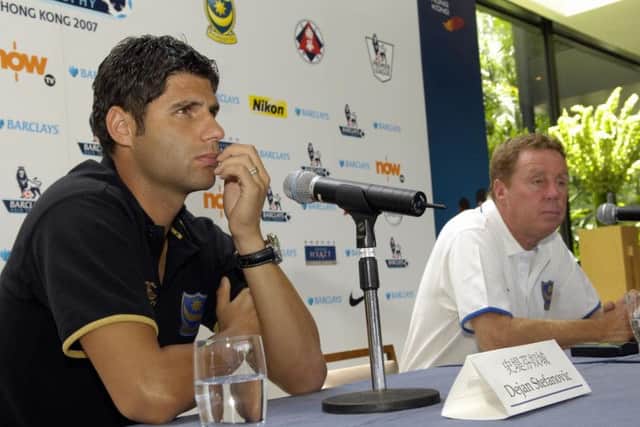 Dejan Stefanovic, left, with Harry Redknapp on Pompey's tour of Hong Kong in 2007