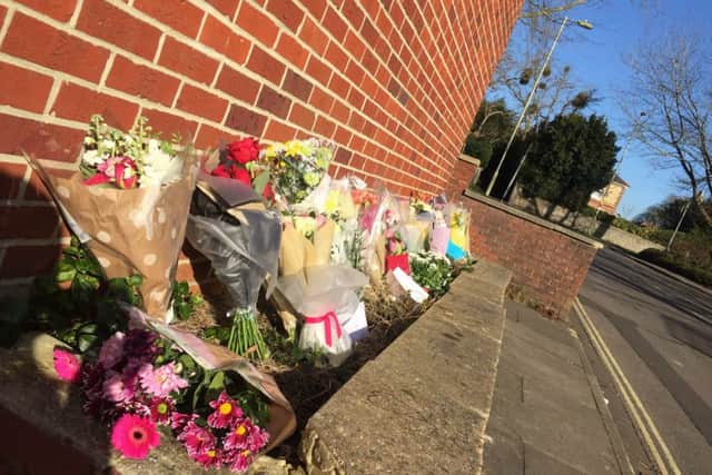 Flowers laid in tribute outside the multi-storey car park on Osborn Road, Fareham