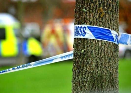 A main road has been closed off after a suspected bomb was found