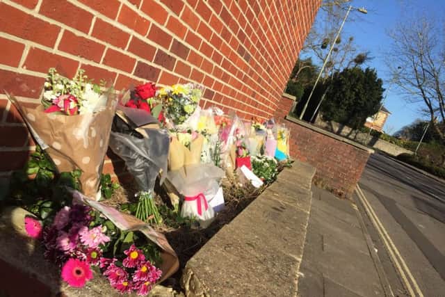 Flowers laid in tribute outside the multi-storey car park on Osborn Road, Fareham