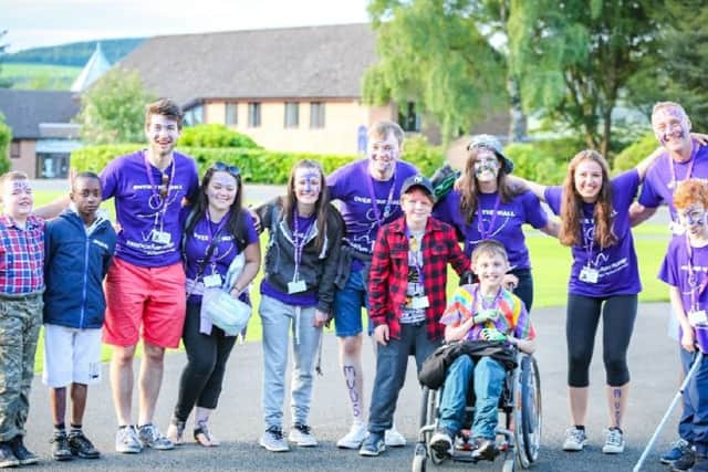 Youngsters and volunteers from Over The Wall. Picture: Spencer Butt