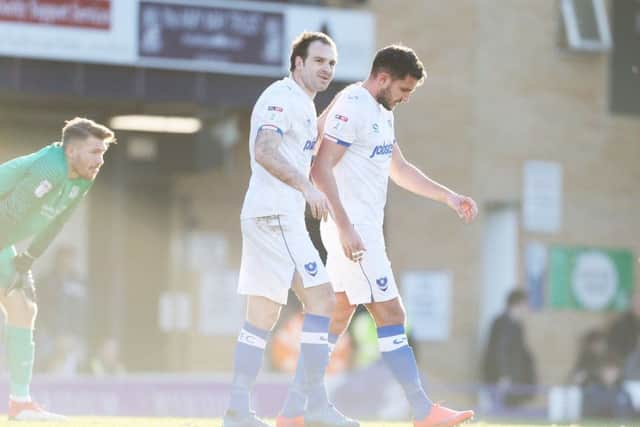 Gareth Evans and Brett Pitman went off injured. Picture: Joe Pepler