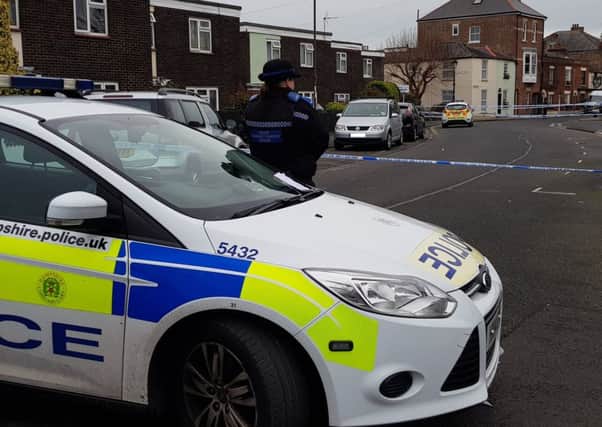 Police at the scene of the attempted murder in Middle Street, Portsmouth