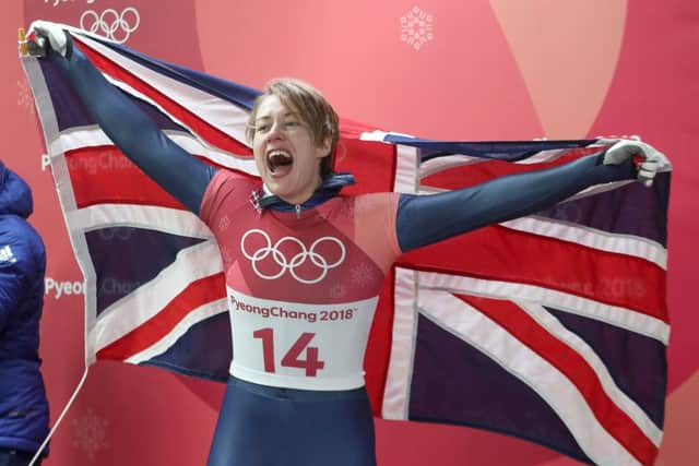 Lizzy Yarnold celebrates winning gold