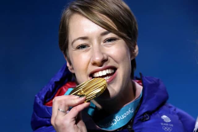 Great Britain's Lizzy Yarnold poses with her gold medal