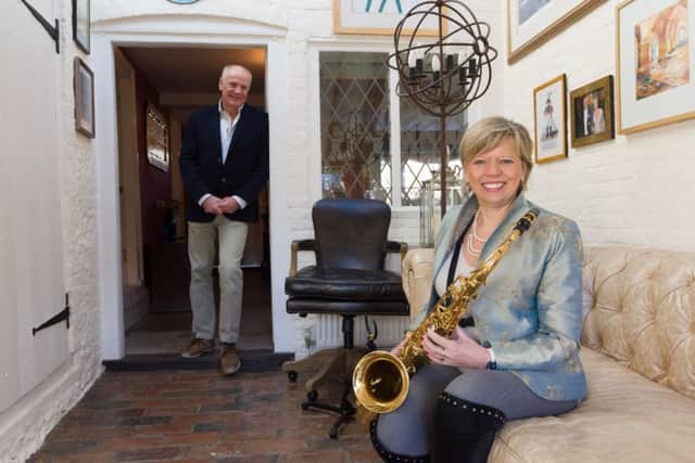 Dr Penelope Gordon with her husban Lionel Jarvis. Penelope has written a book on her time working in Doha. She is also a yachtswoman and saxophonist.   Picture: Duncan Shepherd (180097-009)