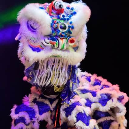 A traditional Chinese lion dance at Guildhall Picture: Keith Woodland