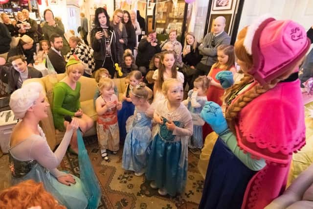All the princess's enjoying a sing-a-long as parents look on  (180121-008)