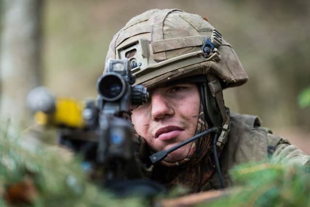 Pte Tom Canwell from Portsmouth, on alert against enemy attacks during war games in Germany