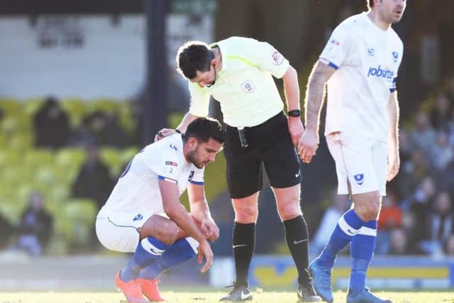 Gareth Evans is checked by referee Lee Probert following his goal on Saturday
