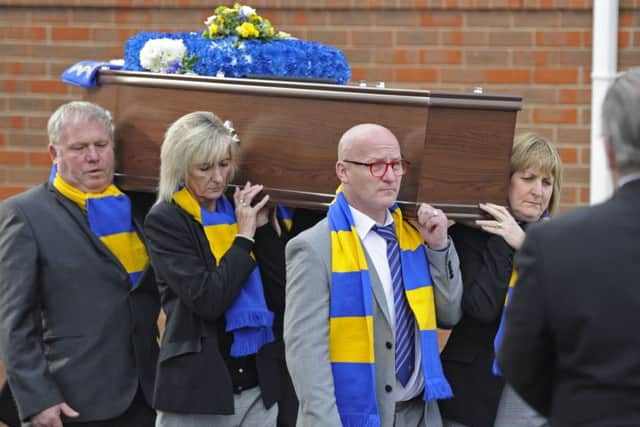 Mourners and football fans attend the funeral at St Johns Church in Gosport, of former football coach Ronnie Williamson who died without any family members