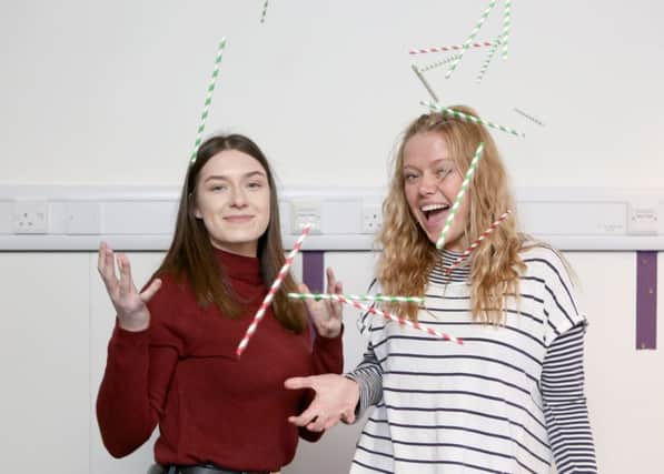 .
Students Patrycja Sobczyk and Tyler Scoble pictured with the paper straws at Portsmouth University Library     Picture: Habibur Rahman