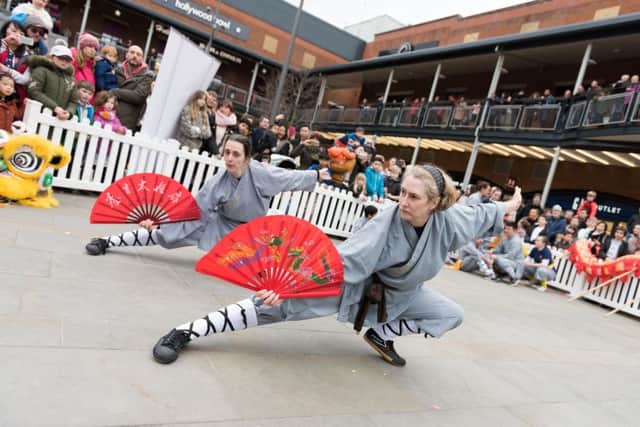 Dancing at Chinese New Year celebrations at Gunwharf Quays   
PICTURE: Duncan Shepherd