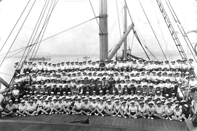 Seen on the focsle  of HMS Implacable are Portsmouth Sea Rangers in 1937. Lord and Lady Baden-Powell are in the middle. Picture: Robert James Collection