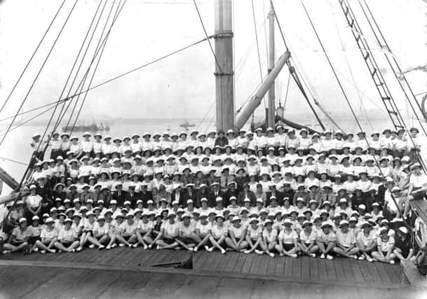 Seen on the focsle  of HMS Implacable are Portsmouth Sea Rangers in 1937. Lord and Lady Baden-Powell are in the middle. 
Picture: Robert James Collection