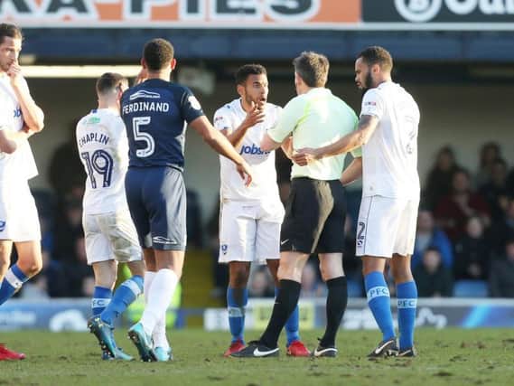 Nathan Thompson gets his marching orders from referee Lee Probert at Southend on Saturday