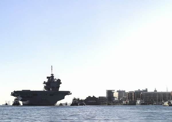 The HMS Queen Elizabeth photo was on the Royal Navy website.