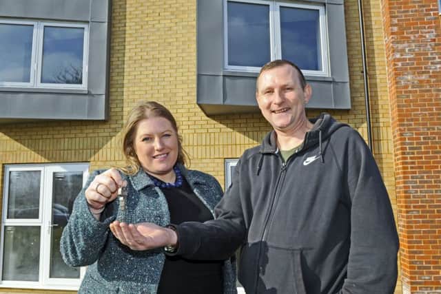 Councillor Donna Jones, the Leader of Portsmouth City Council hands over the keys to Mark Tickner     Picture: Malcolm Wells