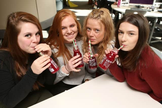 Students Paige Searle, Laura Pimm, Tyler Scoble and Patrycja Sobczyk pictured with the paper straws at Portsmouth University Library. 
Picture: Habibur Rahman