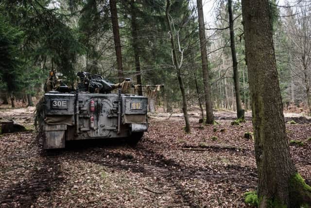 A Warrior Fighting Vehicle in woods