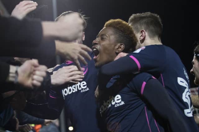Pompey celebrate their second goal at Fleetwood. Picture: Mark Robinson