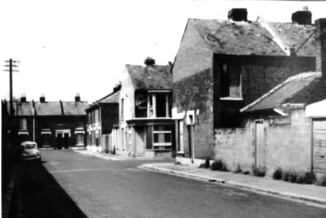 Looking west along Tipner Street with Cobbett Road on the right and Vanners General Stores on the corner. Picture: Bob Thompson