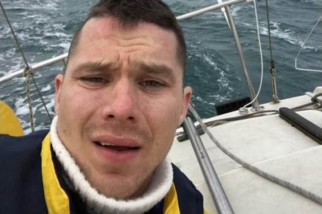 Dmytro Kriuk grinning on the yacht
