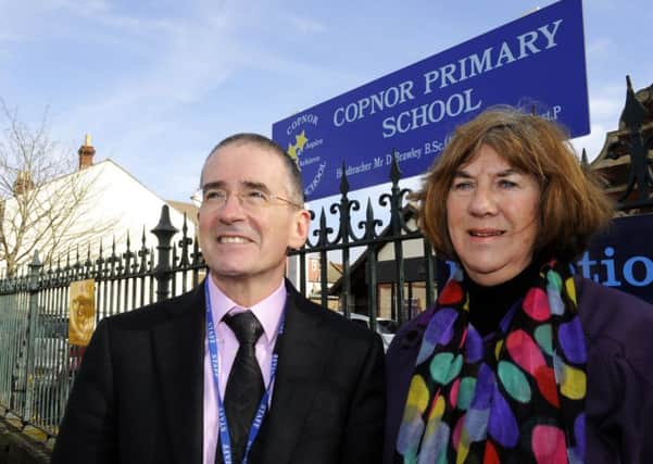 Headteacher Douglas Brawley with  Lib Dem Councillor Lynne Stagg outside Copnor Primary School Picture:  Malcolm Wells (180220)