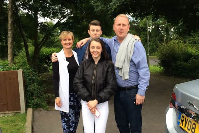 Katie Scannell with parents Jason and Michelle, and brother Harry