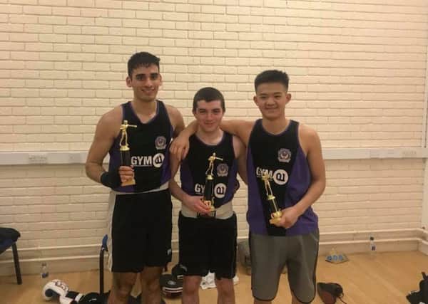 From left to right: Gym01 and University of Portsmouth team Taren Aujla, Ryan Rodruigez and Reswon Rai following their win at the University of Exeter. Picture: James Connor