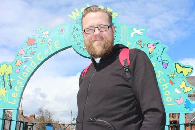 The Rev Tim Watson, outside the Leesland C of E Infant Schools in Gosport. He is setting up a new church.