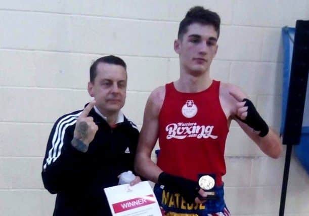 Gosport ABC's Mateusz Bereznicki celebrates with Tony Gaze, left