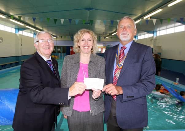 The Rotary Club of Gosport donated Â£5,000 to Leesland Junior School to help with their fundraising efforts