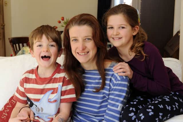We're going 'no plastic' says Clare Seek at her family home in Southsea with children Kester Seek and Mariella
Picture: Malcolm Wells (180215-6534)